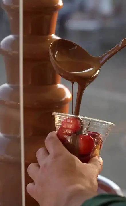 Strawberries dipped in the fountain